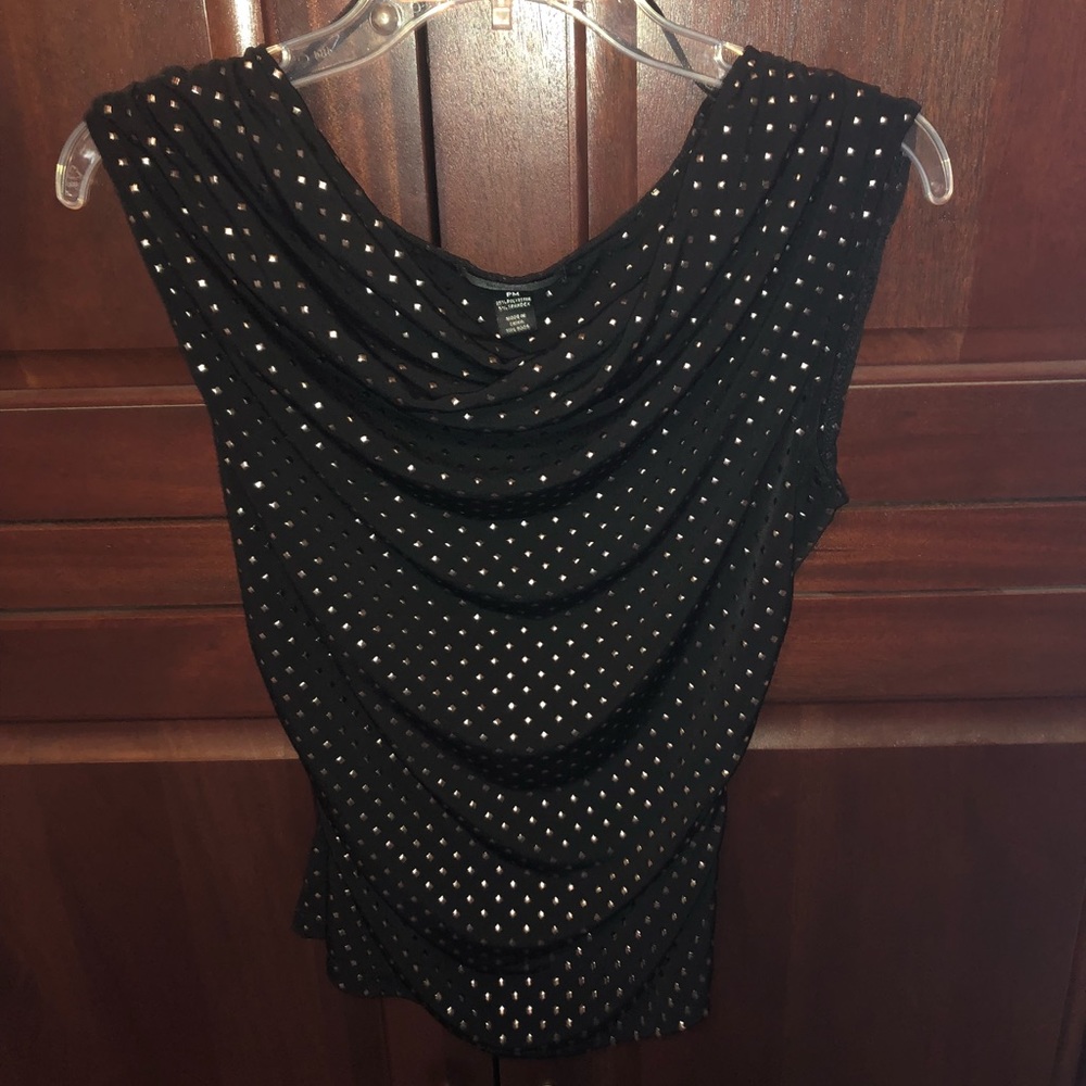 Sleeveless draped silver accented top